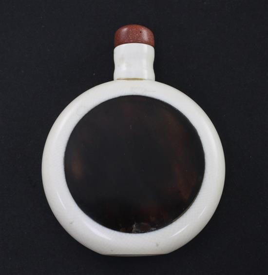 A Chinese ivory and tortoiseshell snuff bottle, early 20th century, 6.3cm